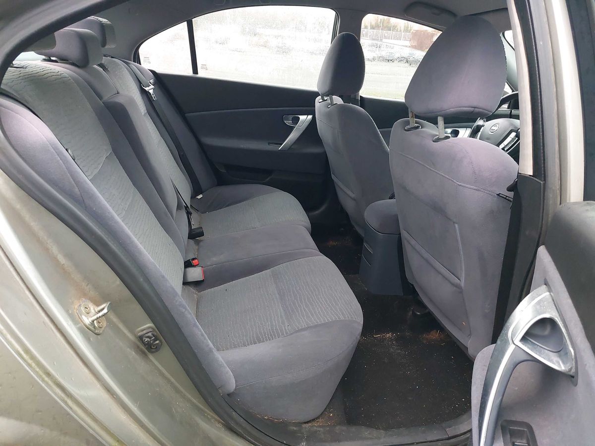 Nissan Primera 2006 — photo 15