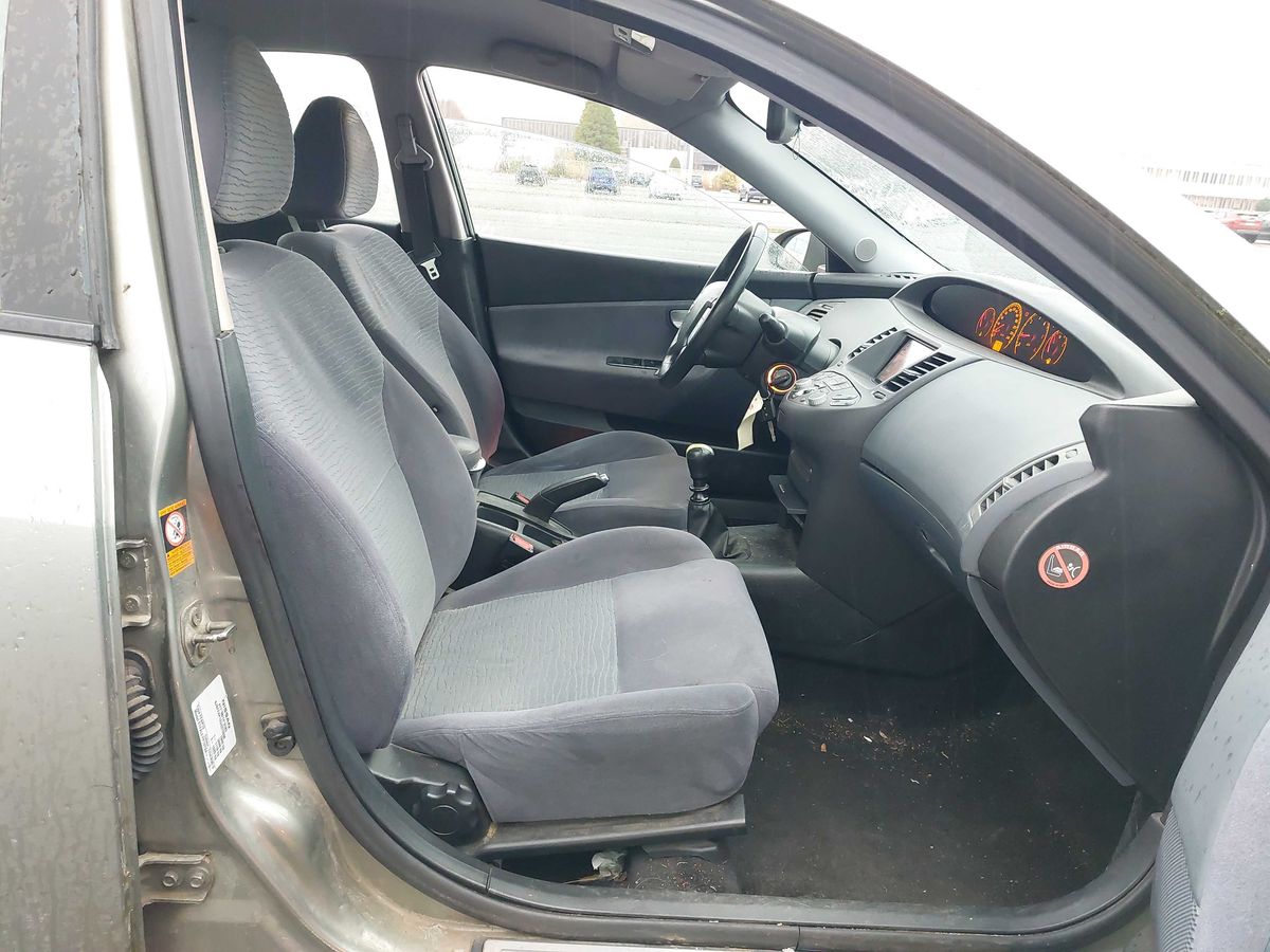 Nissan Primera 2006 — photo 11