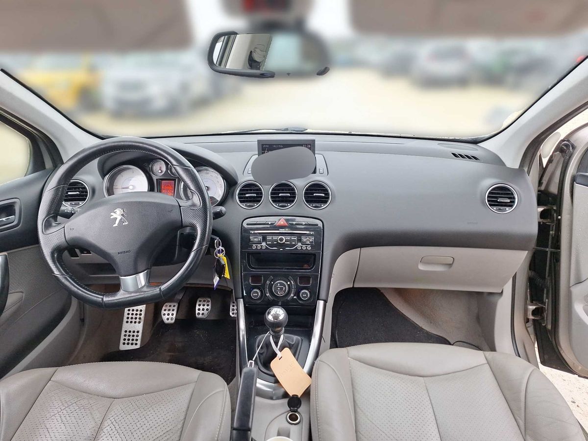 Peugeot 308 2012 — photo 12