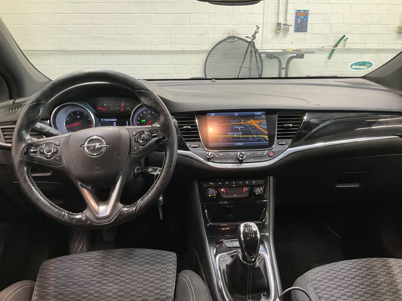 Opel Astra 1.4 SIDI Turbo Dynamic — zdjęcie 12