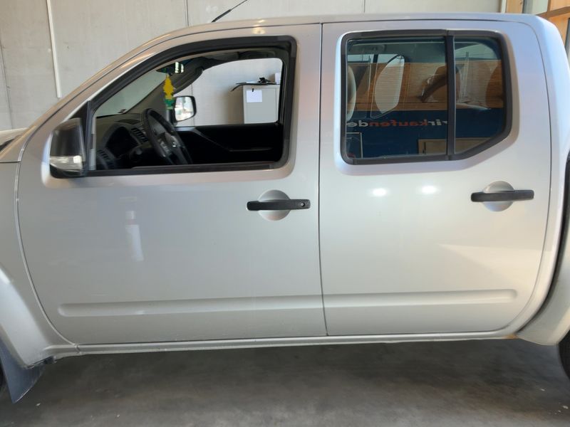 Nissan Navara Pick-up 2.5 dCi Double Cab XE 4x4 — zdjęcie 4