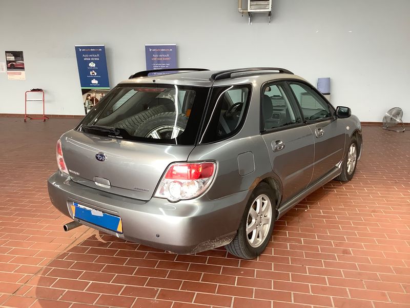 Subaru Impreza 1.5 R — zdjęcie 2