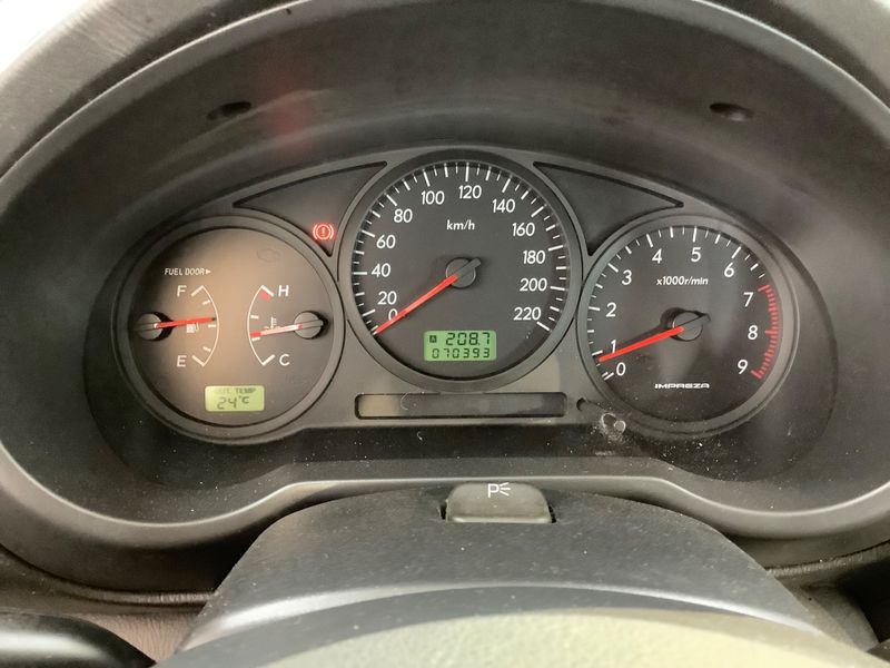 Subaru Impreza 1.5 R — zdjęcie 4