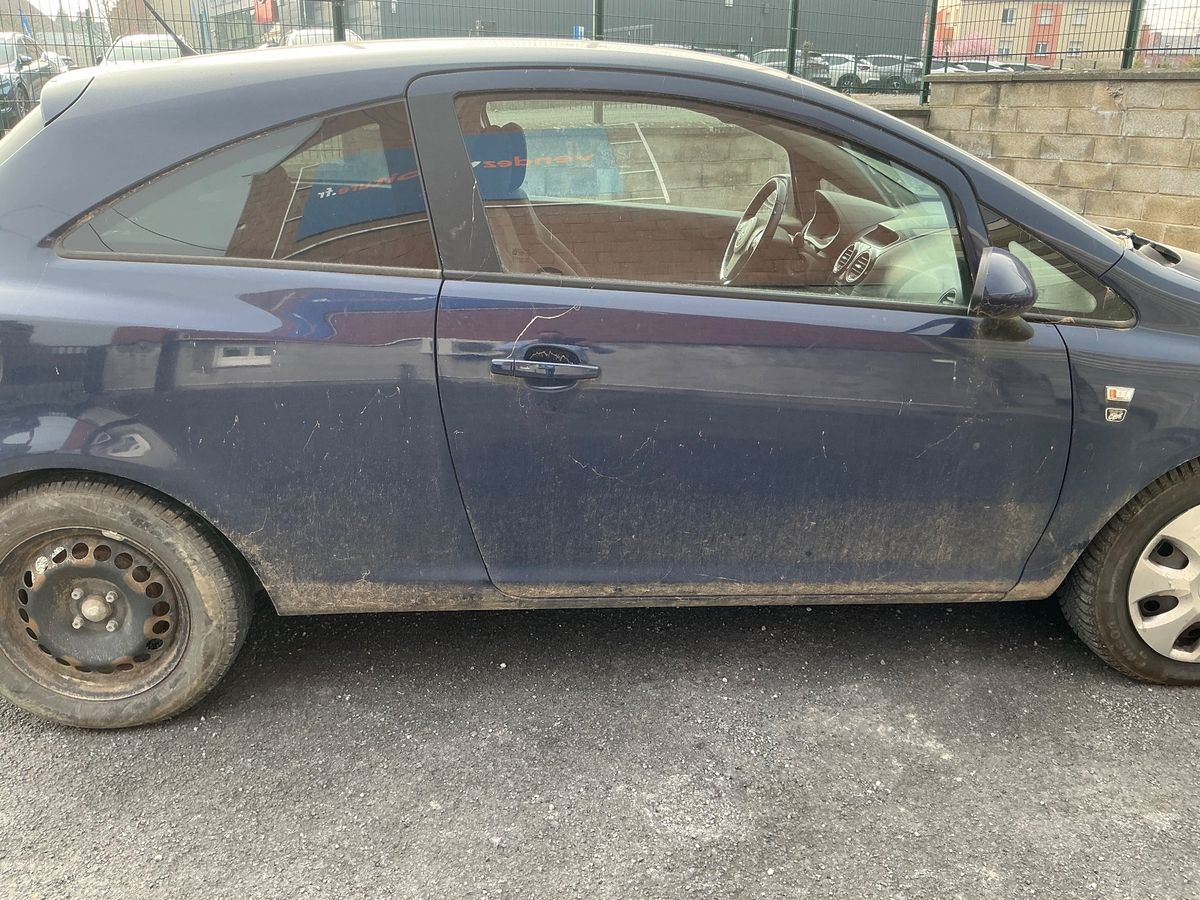 Opel Corsa 2010 — photo 11