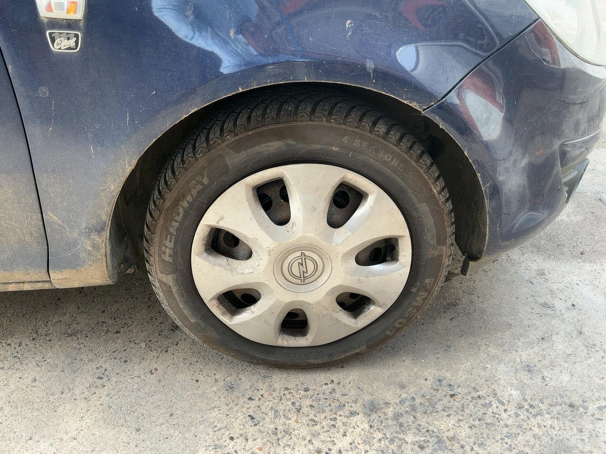 Opel Corsa 2010 — photo 12