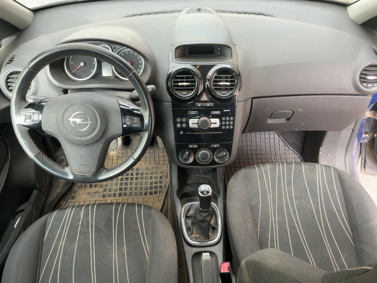 Opel Corsa 2010 — photo 18