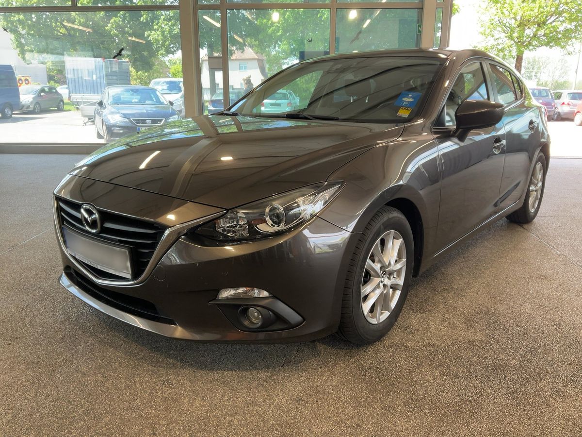 Mazda 3 2015 — photo 1