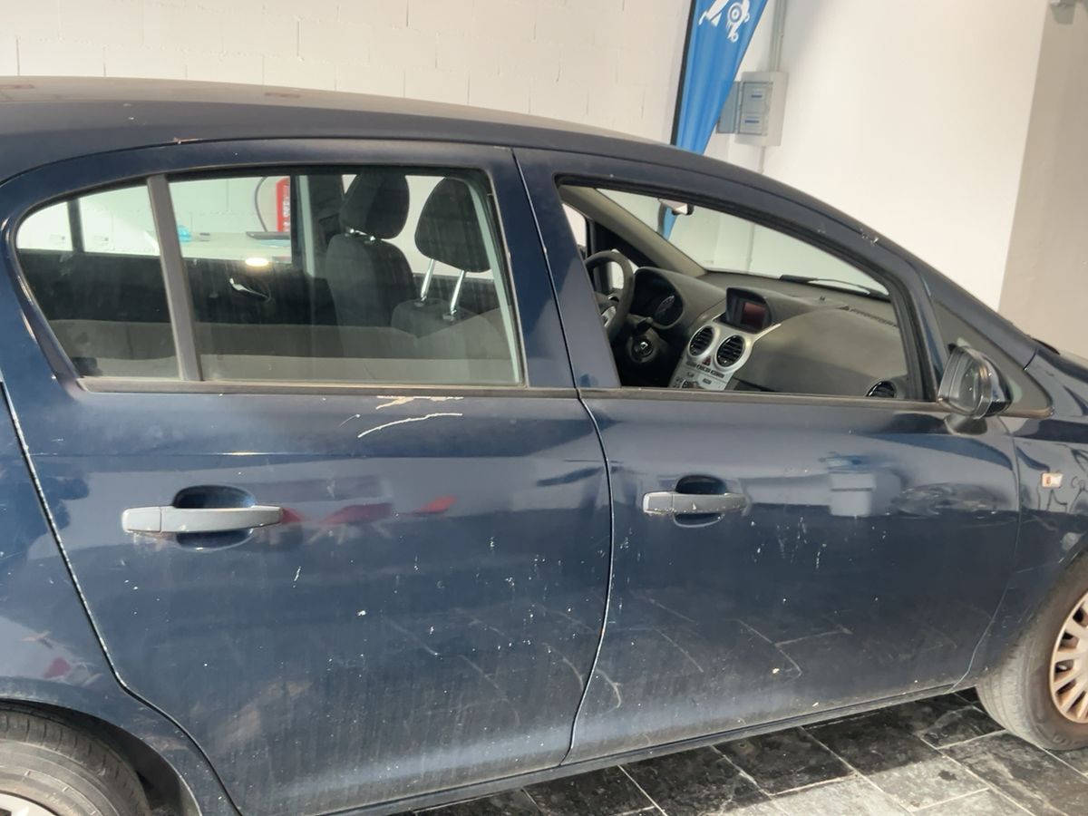 Opel Corsa 2014 — photo 11