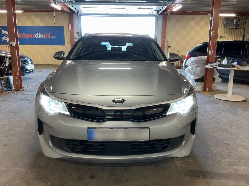 Kia Optima 2.0 Hybrid Attract — zdjęcie 9