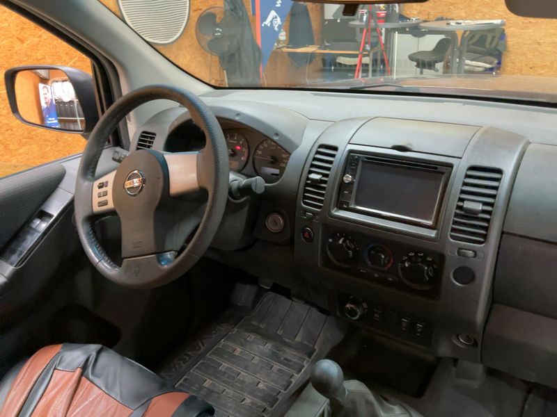 Nissan Navara Pick-up 2.5 dCi King Cab XE 4x4 — zdjęcie 12