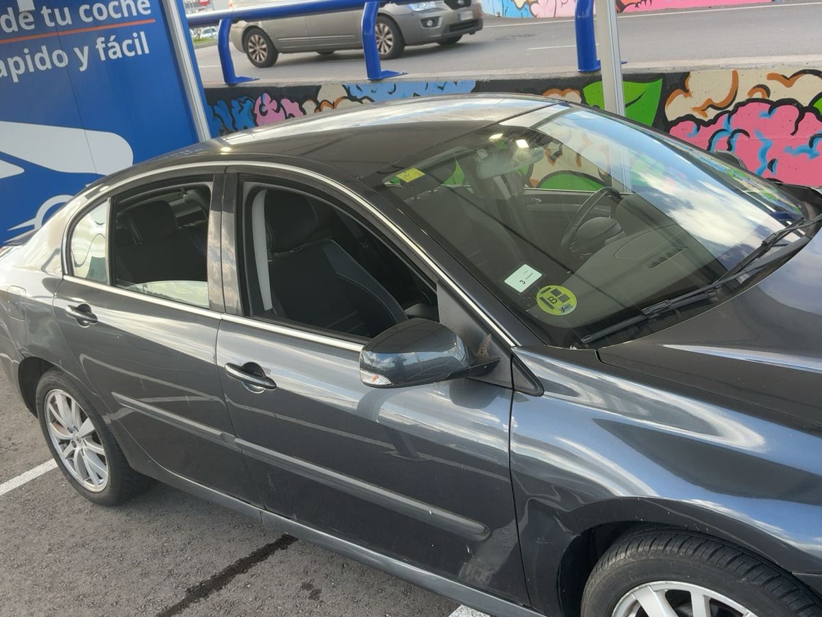 Renault Laguna 2013 — photo 13