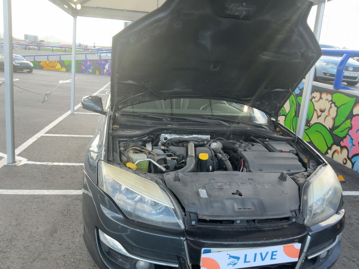 Renault Laguna 2013 — photo 23