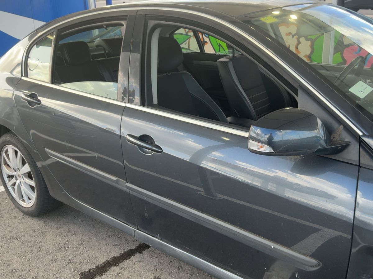 Renault Laguna 2013 — photo 11