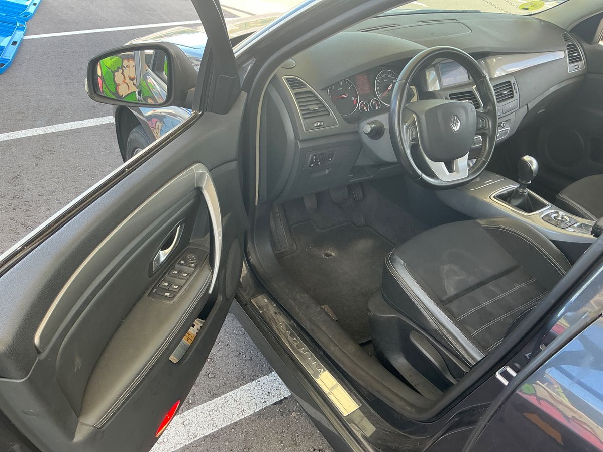 Renault Laguna 2013 — photo 30