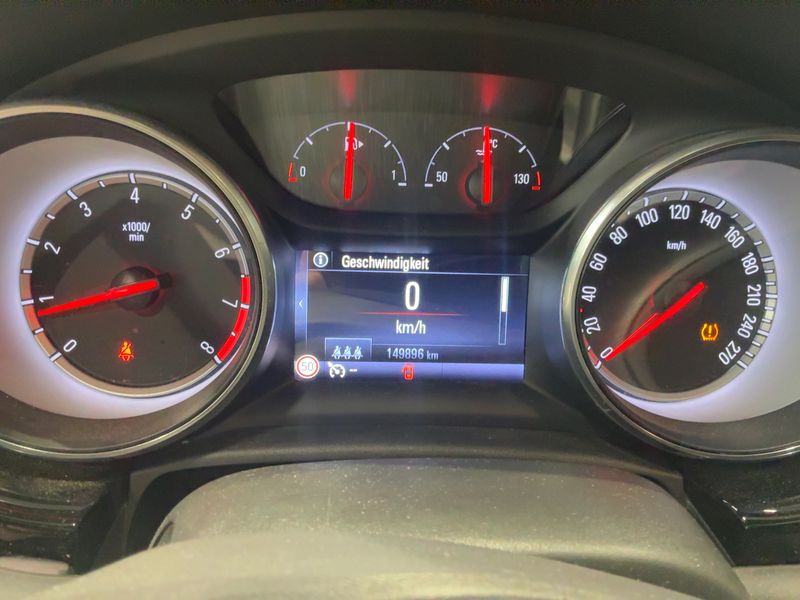 Opel Astra 1.4 SIDI Turbo Dynamic — zdjęcie 13