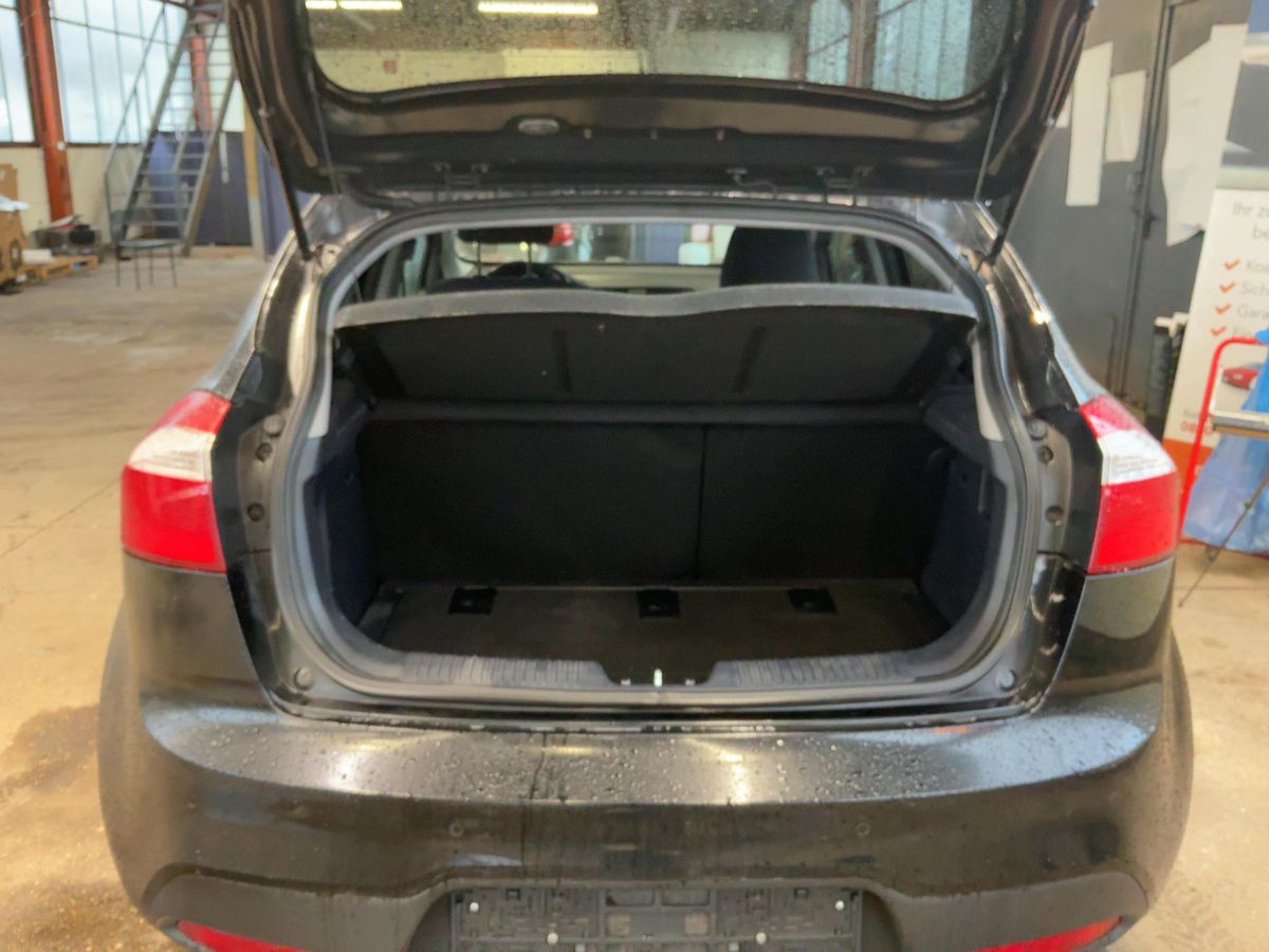 Kia Rio 2014 — photo 16
