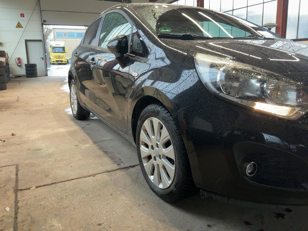 Kia Rio 2014 — photo 13