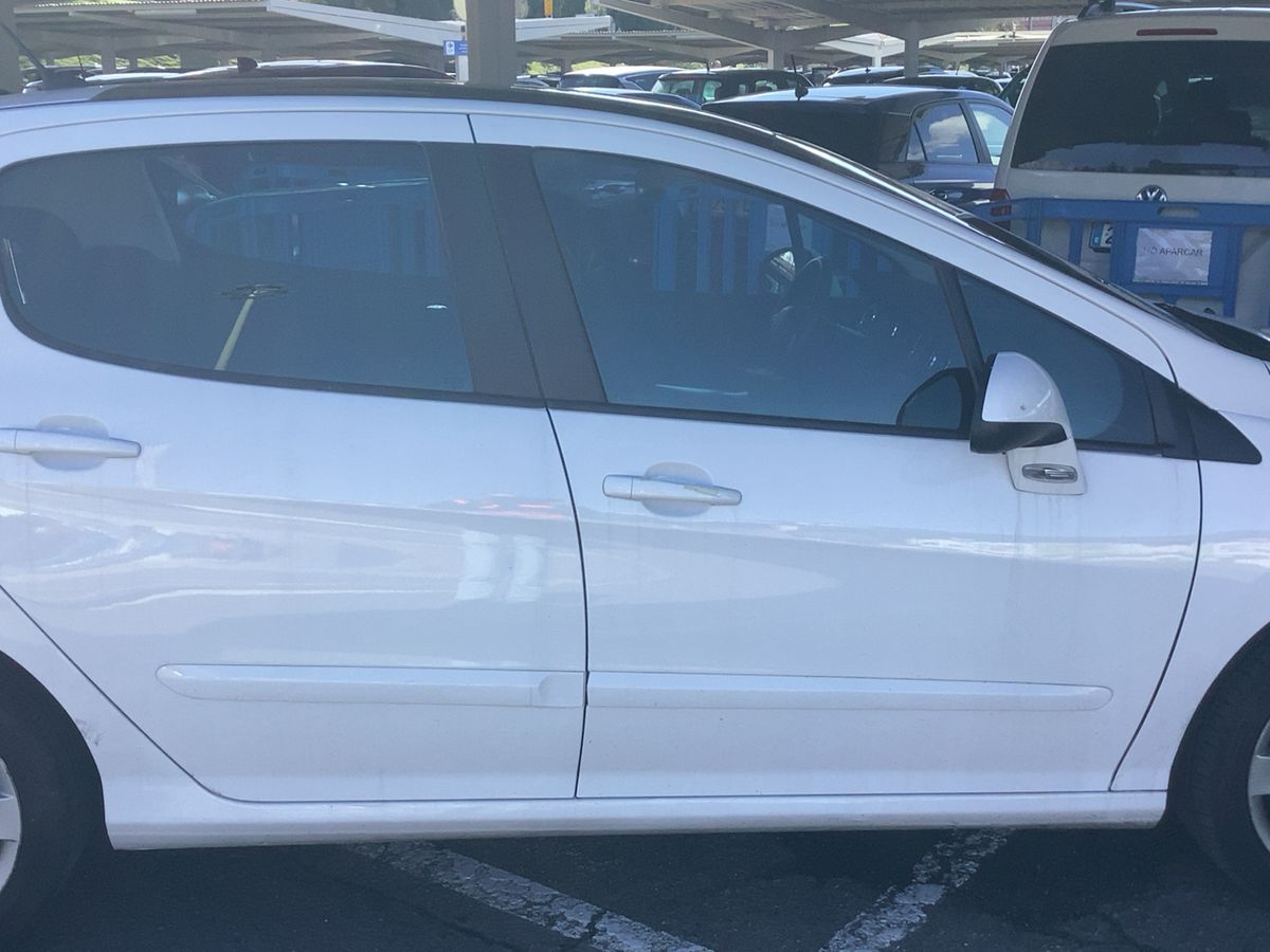 Peugeot 308 2009 — photo 11
