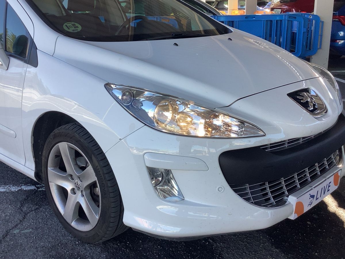Peugeot 308 2009 — photo 13