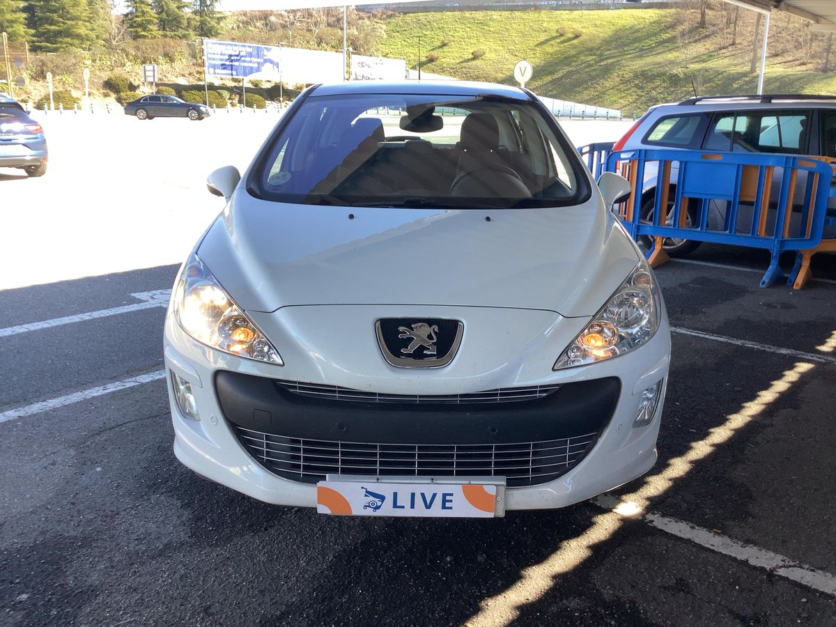 Peugeot 308 2009 — photo 15