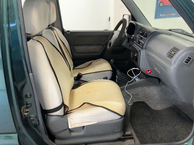 Suzuki Jimny 1.3 Lim. — zdjęcie 11