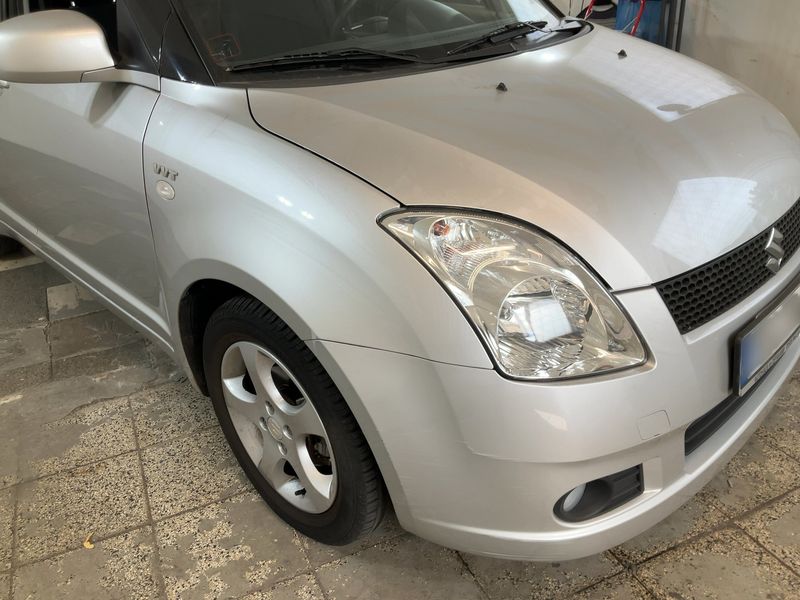 Suzuki Swift 1.5 Comfort — zdjęcie 8