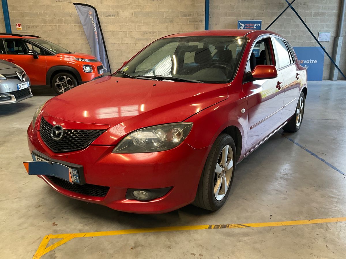 Mazda 3 2005 — photo 1