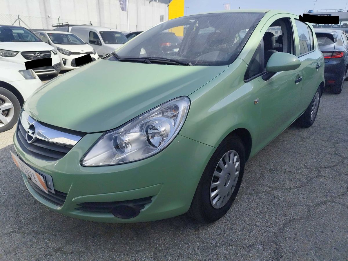 Opel Corsa 2010 — photo 1