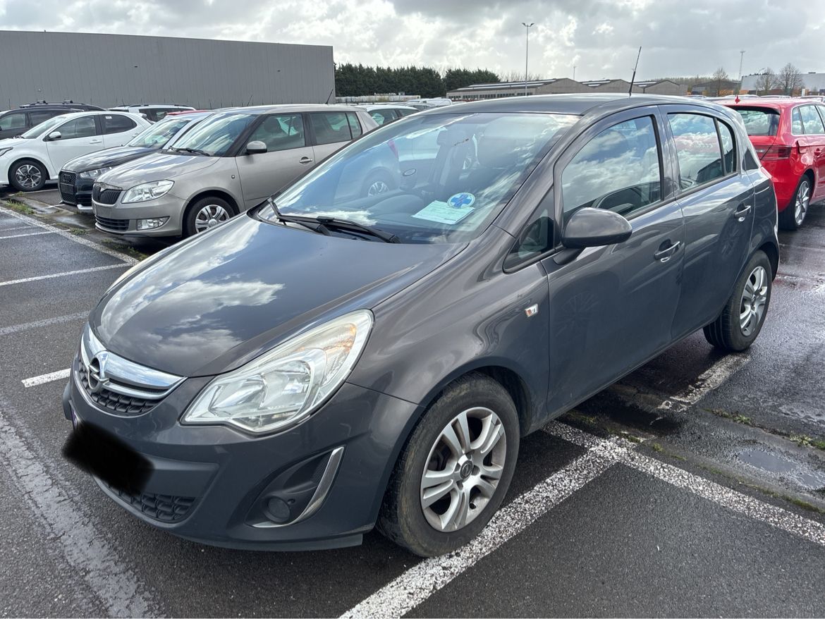 Opel Corsa 2013 — photo 1