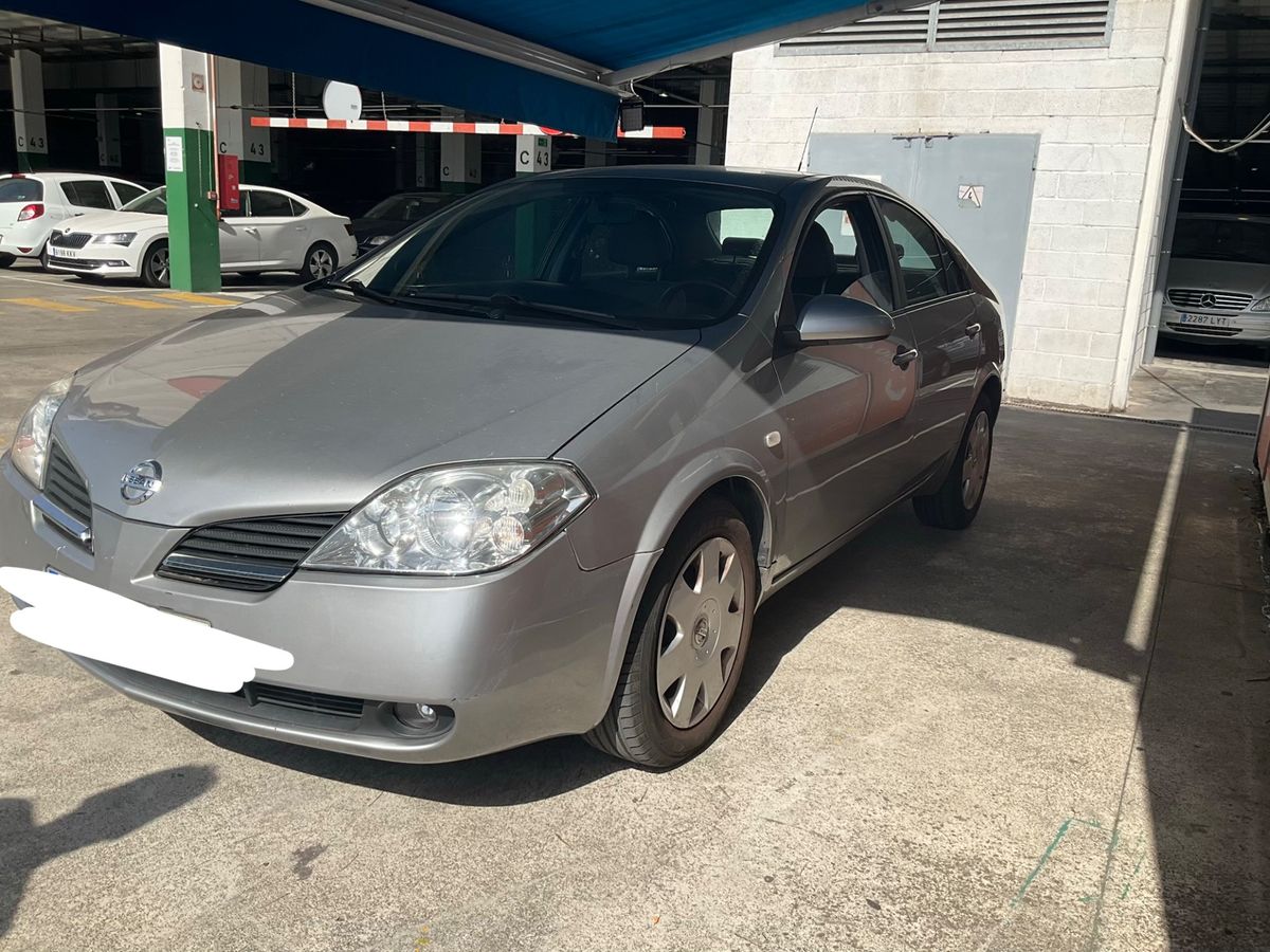 Nissan Primera 2006 — photo 1