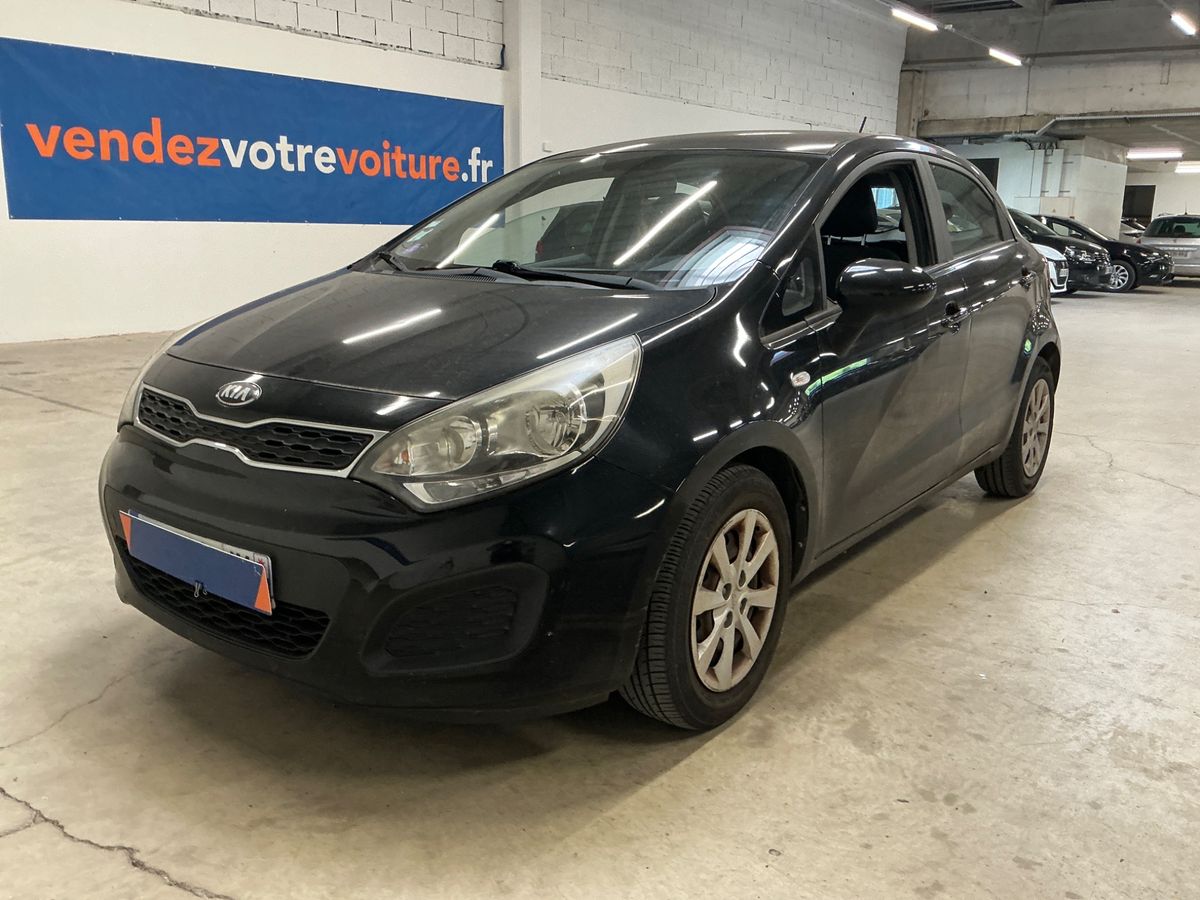 Kia Rio 2013 — photo 1