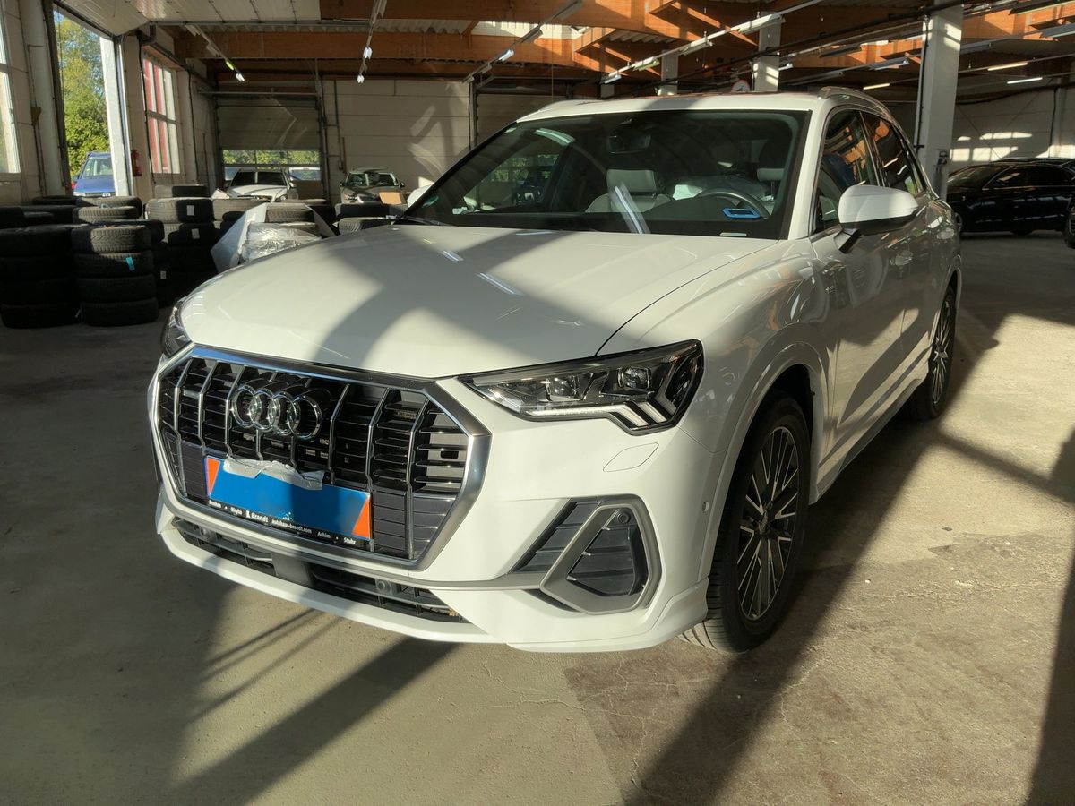 Audi Q3 2019 — photo 1