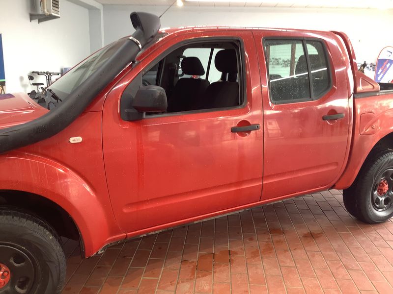 Nissan Navara Pick-up 2.5 dCi Double Cab XE 4x4 — zdjęcie 4