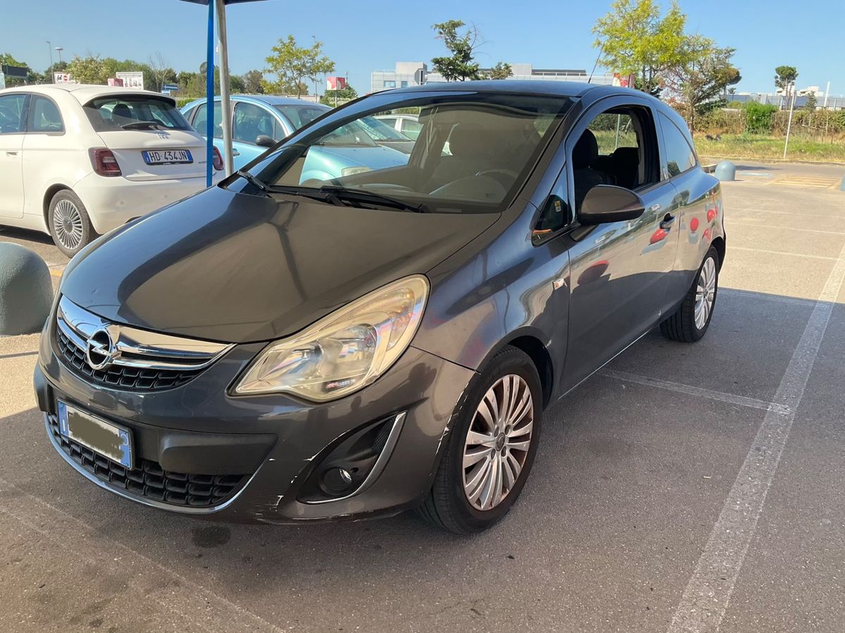 Opel Corsa 2011 — photo 1