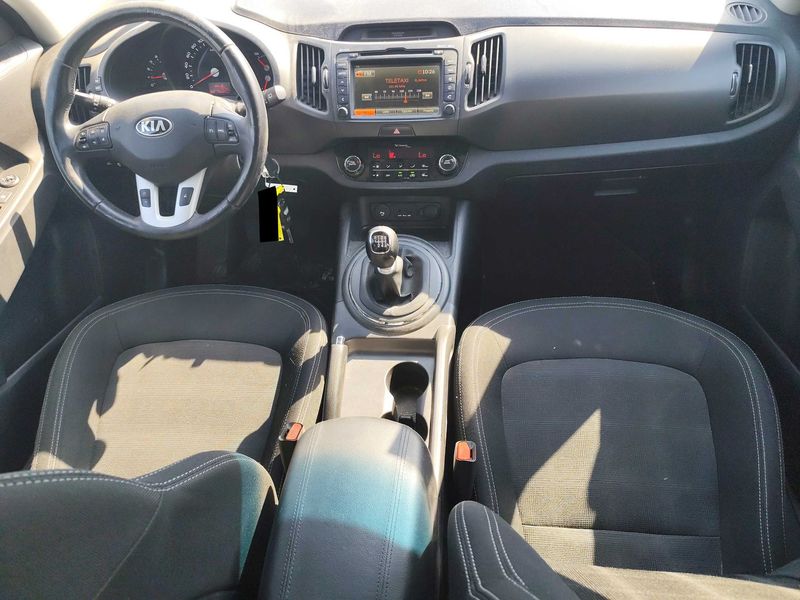 Kia Sportage 1.7 CRDi Drive 4x2 — zdjęcie 11