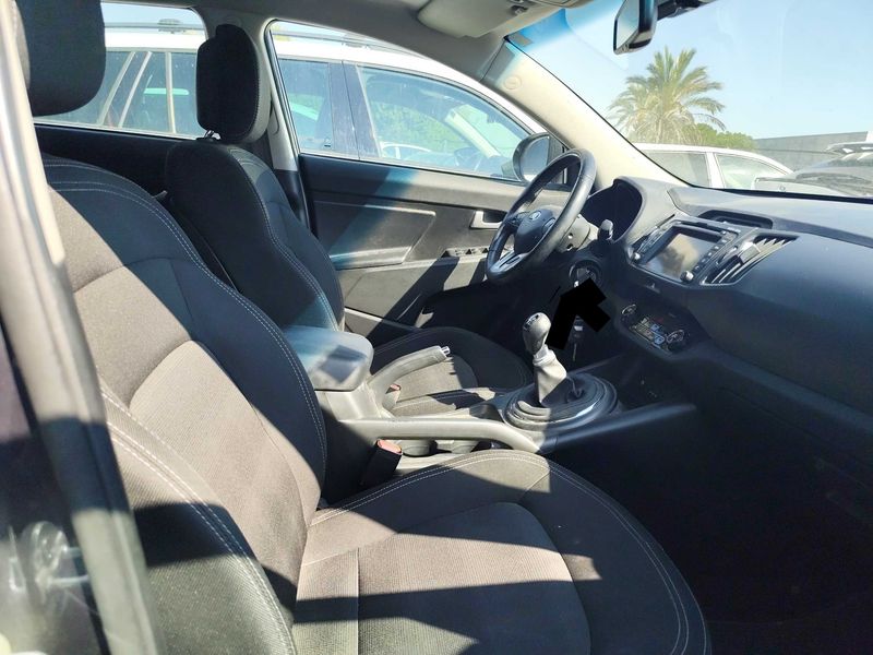 Kia Sportage 1.7 CRDi Drive 4x2 — zdjęcie 10