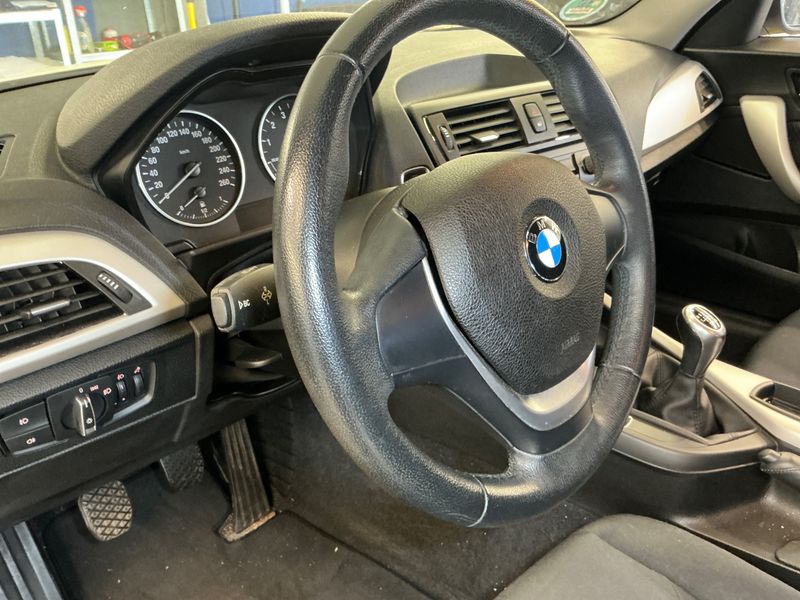 BMW 1er 114i 2013 – снимка 24