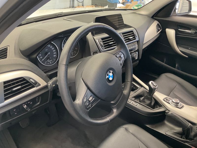 BMW 1er 118d xDrive Advantage 2015 – снимка 30