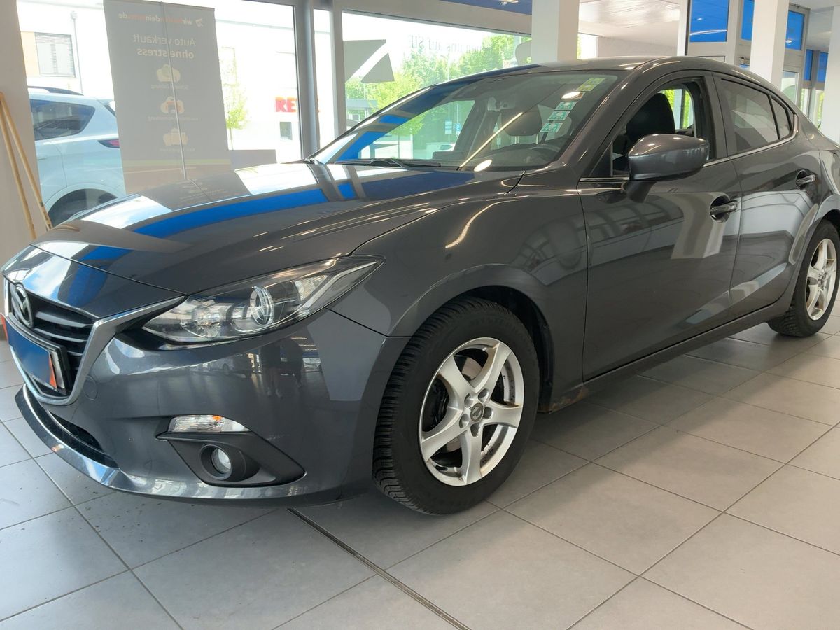 Mazda 3 2014 — photo 1