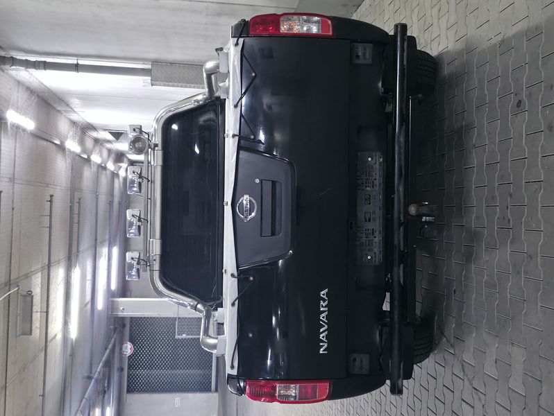 Nissan Navara Pick-up 2.5 dCi King Cab XE 4x4 — zdjęcie 4