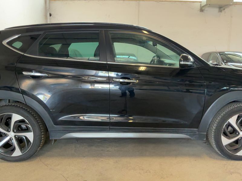 Hyundai Tucson 2.0 CRDi Executive 2WD — zdjęcie 7