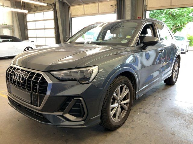 Audi Q3 2019 — photo 1
