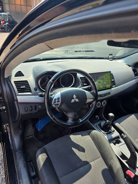 Mitsubishi Lancer 1.5 Invite — zdjęcie 11