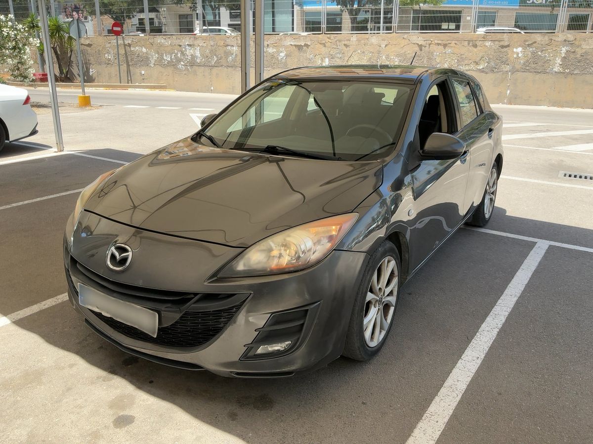 Mazda 3 2011 — photo 1