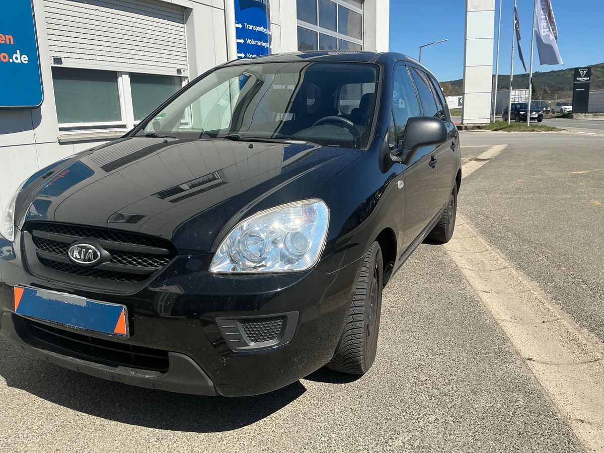 Kia Carens 2010 — photo 1