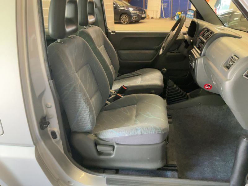 Suzuki Jimny 1.3 JLX — zdjęcie 11