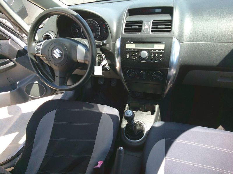 Suzuki SX4 1.9 DDiS Outdoor Line — zdjęcie 11