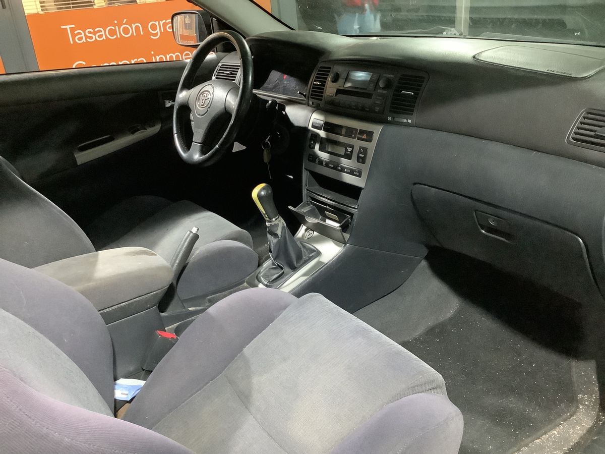 Toyota Corolla 2003 — photo 4